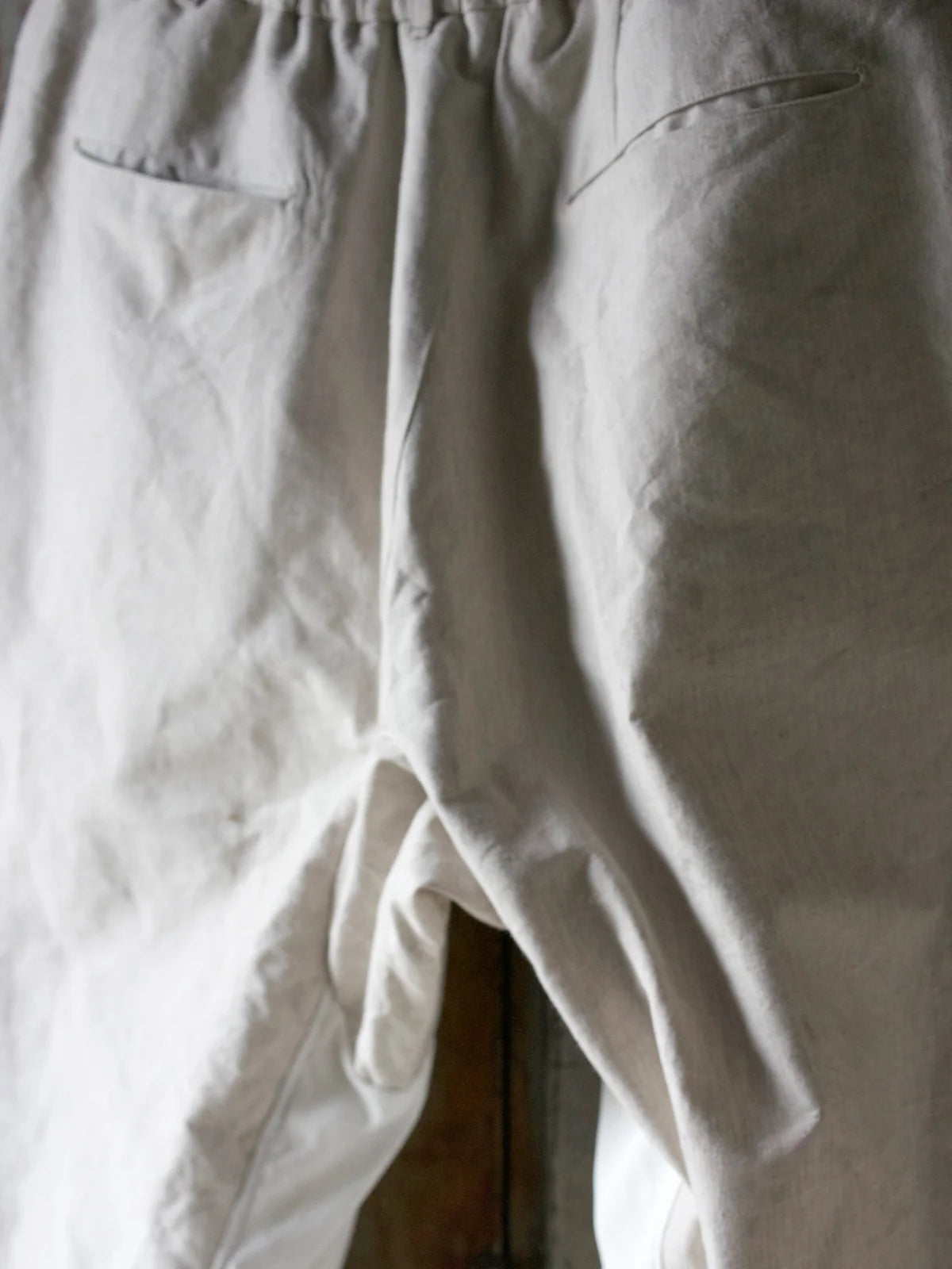 TOKIARI 'JAN' THREE-TUCK CIRCULAR CROTCH WIDE PANTS